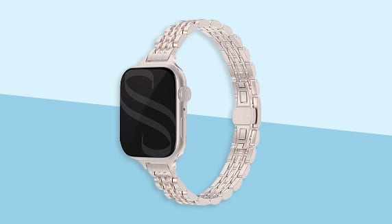 Sterrenlicht kleurig Slim Steel Jubilee Inspired schakelbandje met een Apple Watch in de kleur sterrenlicht.