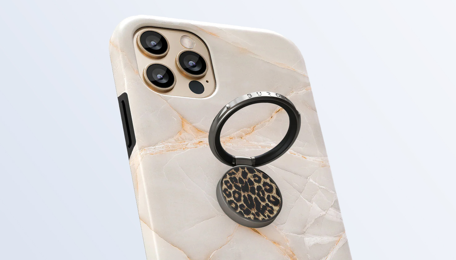 productfoto van een telefoon met een telefoonring met luipaard print